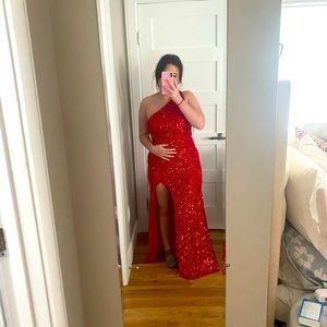 Ian selling this red size 8 dress new